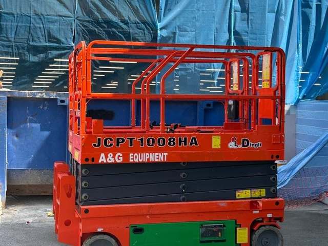 Battery scissor lifts lined up and ready for indoor fit-out work