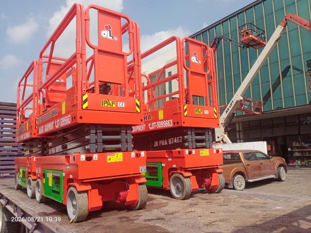 Dingli scissor lifts loaded and strapped on a lorry for site delivery